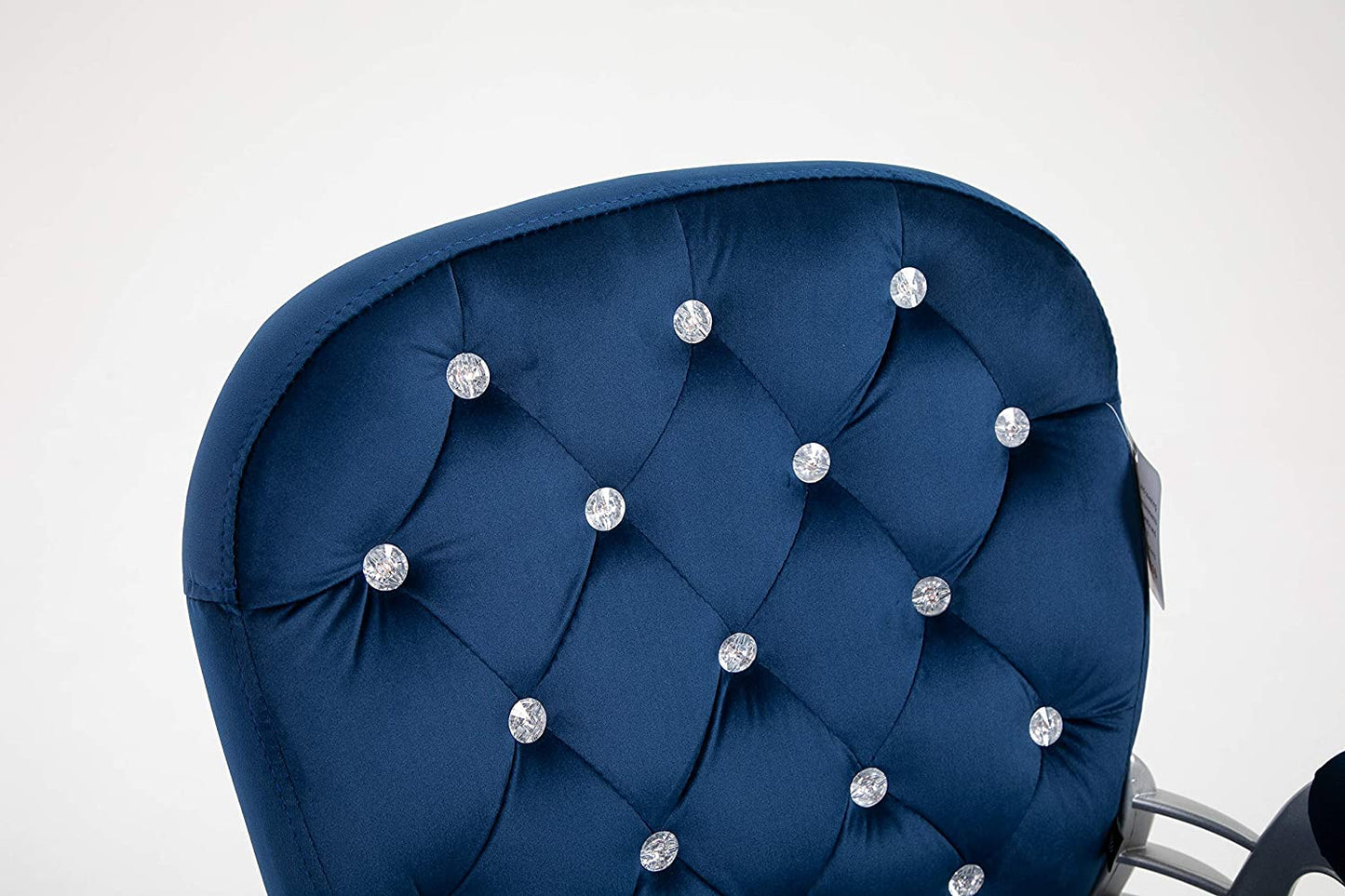 Fauteuil pivotant Chesterfield en velours bleu