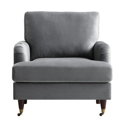 Fauteuil Brigette en velours gris avec pieds à roulettes en laiton antique