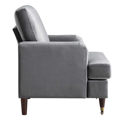 Fauteuil Brigette en velours gris avec pieds à roulettes en laiton antique