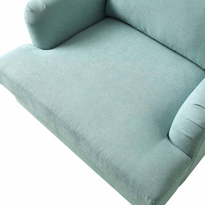 Fauteuil Brigette en tissu brossé doux menthe avec pieds à roulettes en laiton antique