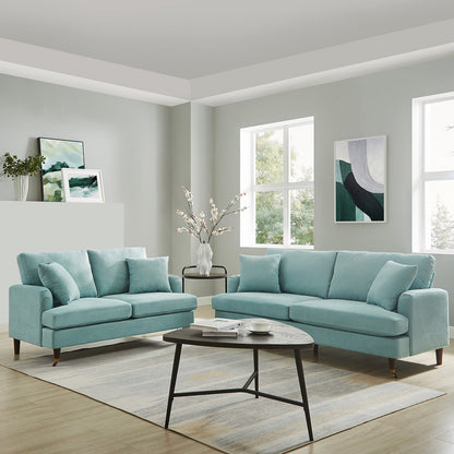 Canapé 3 places Brigette en tissu brossé doux menthe avec pieds à roulettes en laiton antique