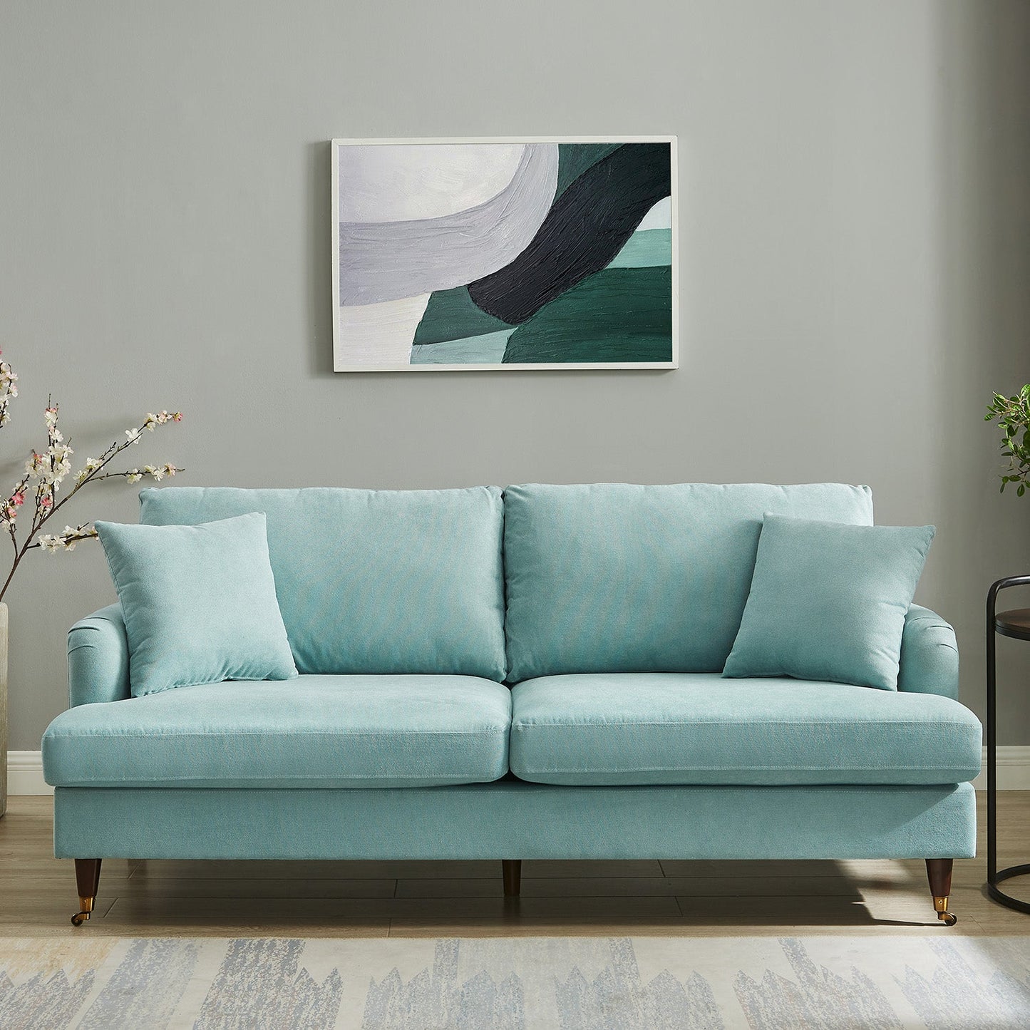 Canapé 3 places Brigette en tissu brossé doux menthe avec pieds à roulettes en laiton antique