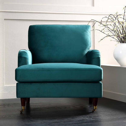 Fauteuil Brigette en velours bleu sarcelle avec pieds à roulettes en laiton antique