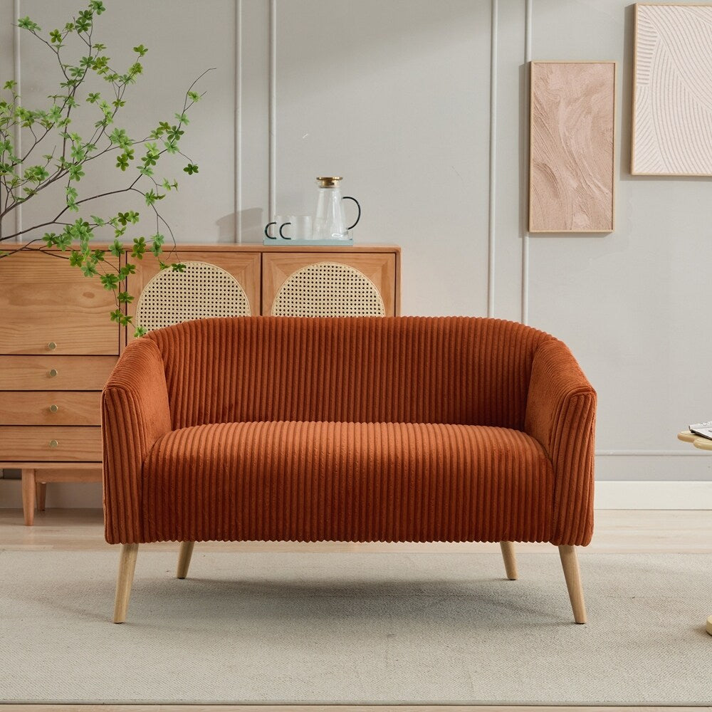 Canapé 2 places recouvert de tissu velours côtelé avec pieds en noyer