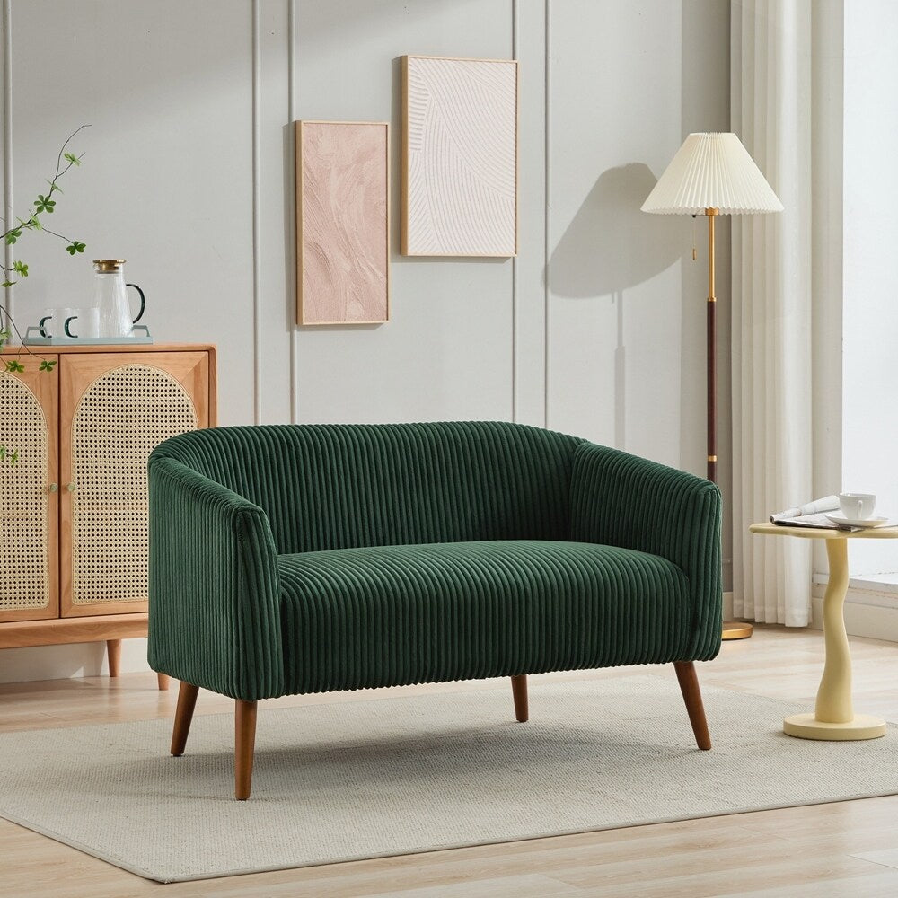 Canapé 2 places recouvert de tissu velours côtelé avec pieds en noyer