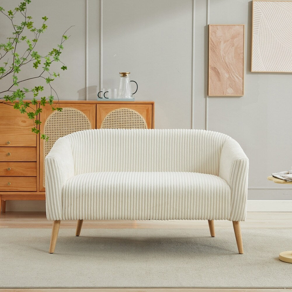 Canapé 2 places recouvert de tissu velours côtelé avec pieds en noyer