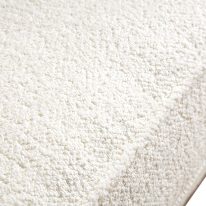 Canapé Dipley en tissu bouclé beige, 3 places