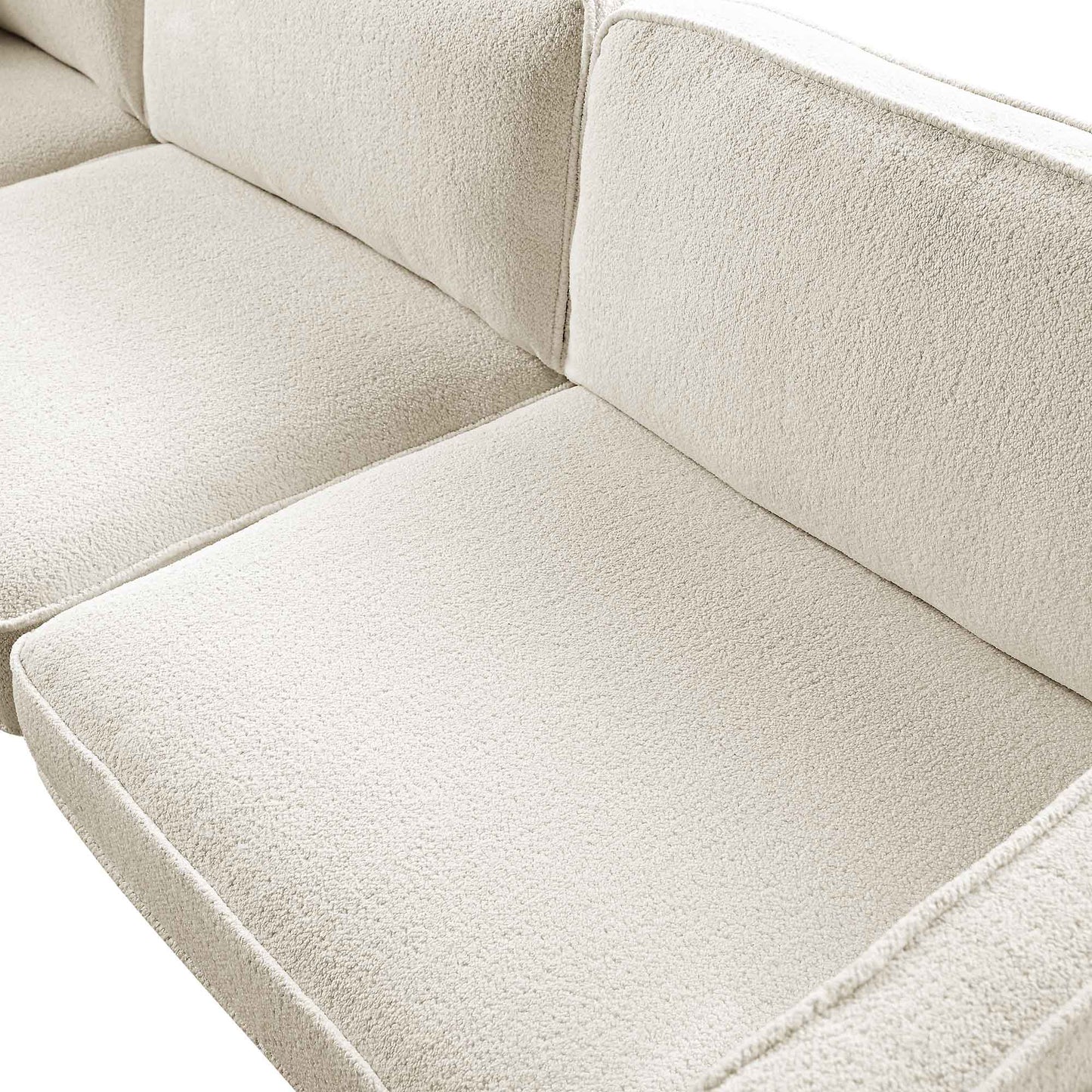 Grand canapé d'angle Dipley en tissu bouclé beige