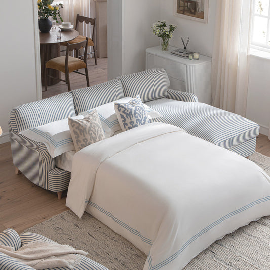 Canapé-lit Daphnis en lin mélangé à rayures bleues, grande méridienne orientée à droite