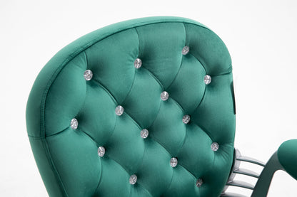 Fauteuil pivotant Chesterfield en velours vert