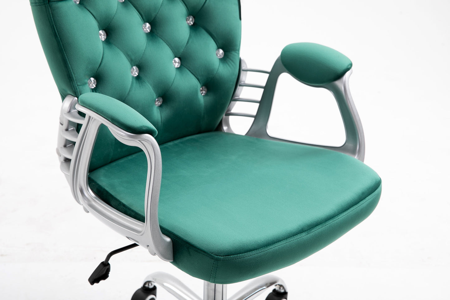 Fauteuil pivotant Chesterfield en velours vert