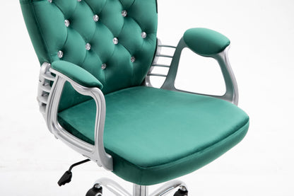 Fauteuil pivotant Chesterfield en velours vert