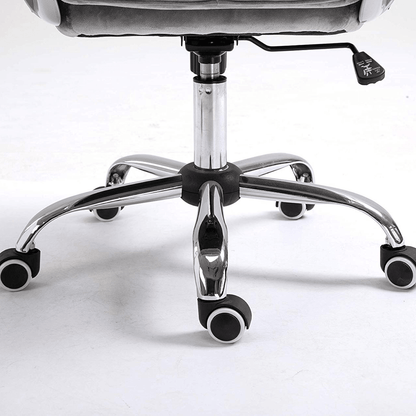 Fauteuil pivotant Chesterfield à dossier moyen en velours gris