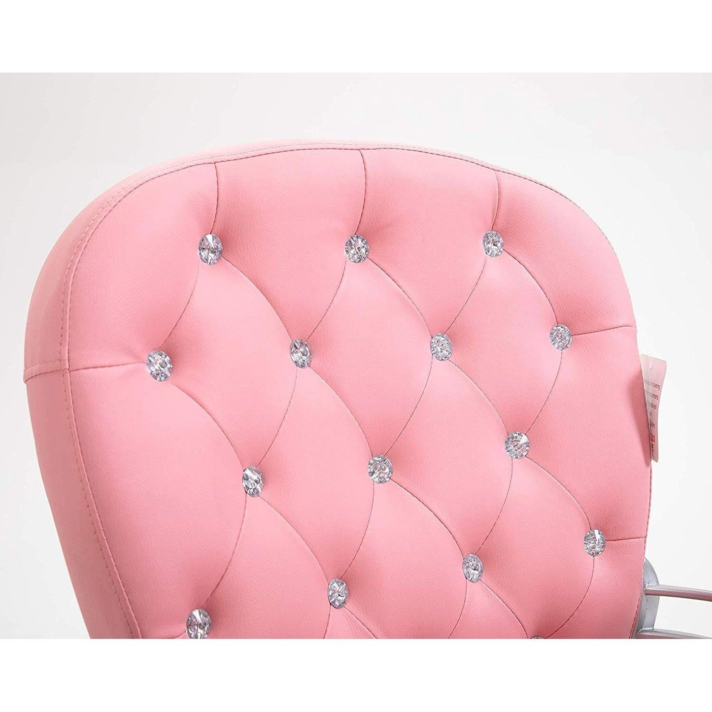Fauteuil pivotant Chesterfield en similicuir rose
