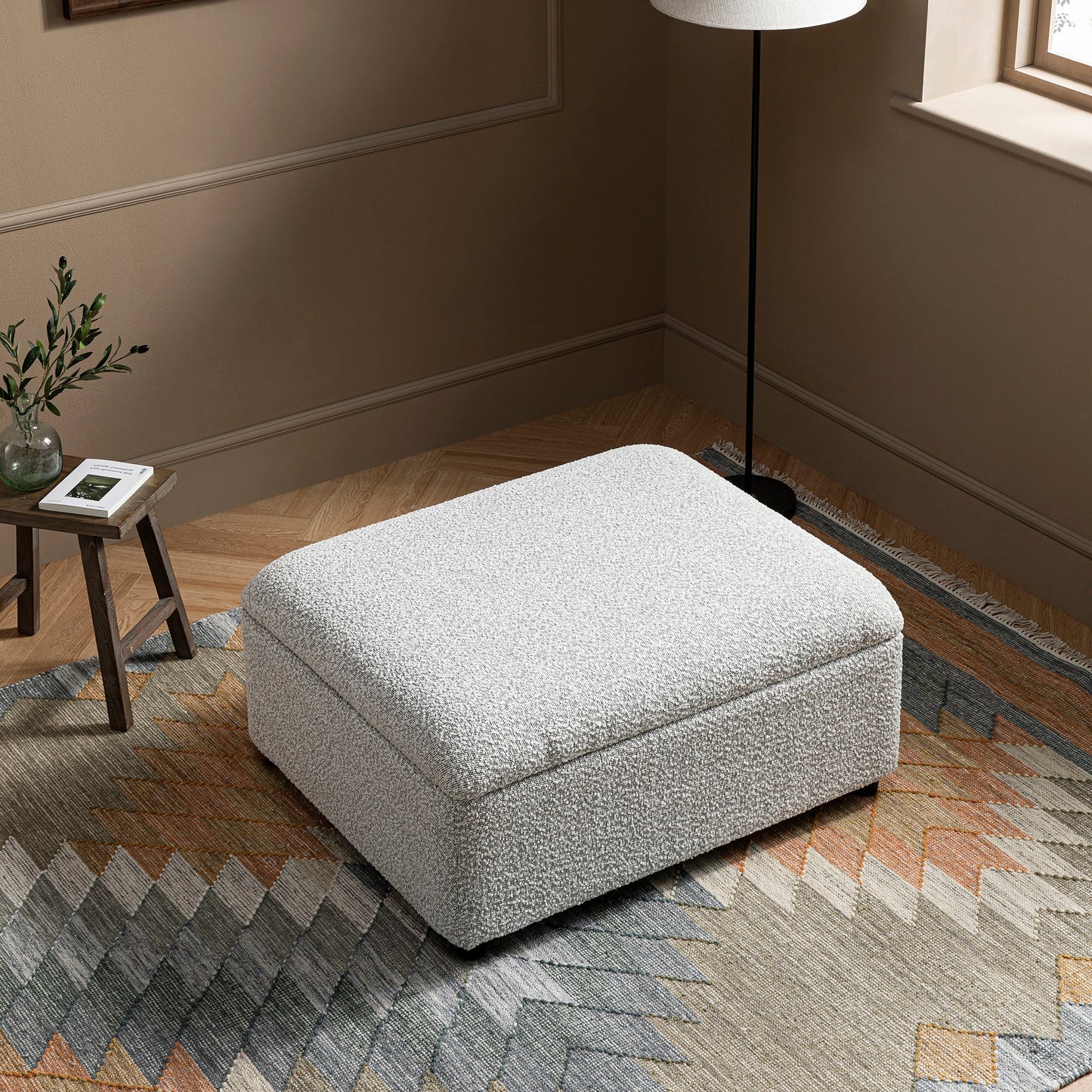 Lit simple pliant Magda dans un pouf, boucle gris brume