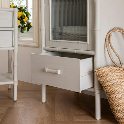 Armoire 1 porte Elstowe en imitation bambou et verre cannelé, blanc ombré