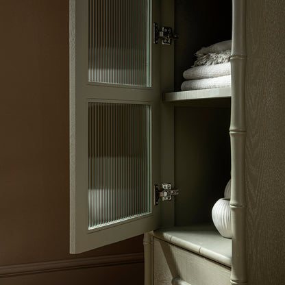 Armoire 1 porte Elstowe en imitation bambou et verre cannelé, vert sauge